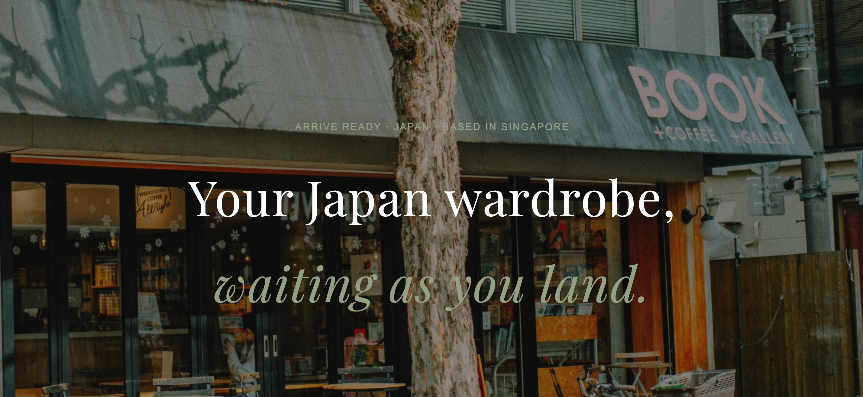 A Japanese streetscape with the words Your Japan wardrobe, waiting as you land.