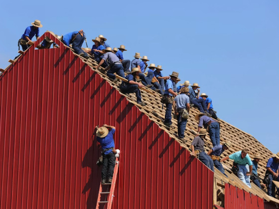 Residential roofing contractors at work